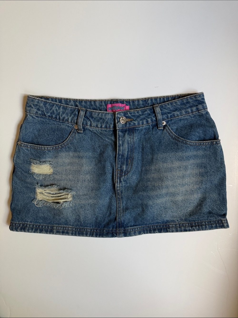 Edikted Distressed Denim Mini Skirt in Blue
